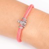 Pulsera de cordón de cabo rosa con cierr mosquetón. Con charm de Virgencita de la Vega en plata de ley. Muestra secundaria