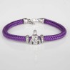 Pulsera de cordón de cabo morado con cierre mosquetón. Con Charm de Virgencita de la Vega. Muestra principal.