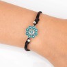 Pulsera cordon de seda negra con Botón Charro de 18 cms de plata de primera ley con esmaltado en turquesa. Foto en muñeca