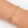 Pulsera de plata bañada en oro de 23 kilates de Botones Charros y filigranas charras con marcasitas. Muestra en muñeca.