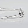 Charm Virgencita de la Cabeza en plata de ley para la pulsera de Pandora o similares. Detalle en pulsera.