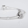 Charm Virgencita de la Cabeza con resplandor en plata de ley para la pulsera de Pandora o similares. Detalle en pulsera.